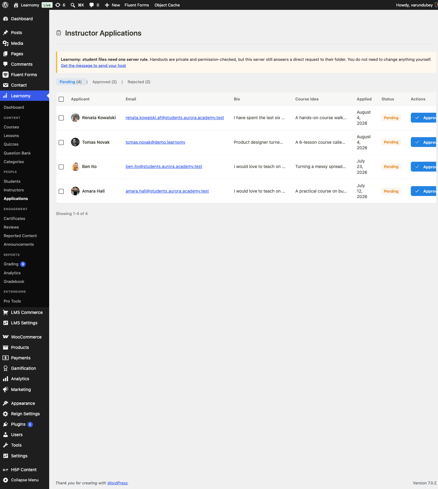 Instructor Applications queue with four pending rows